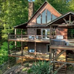 Modern multi-level home with wooden exterior and deck where to stay in Blue Ridge