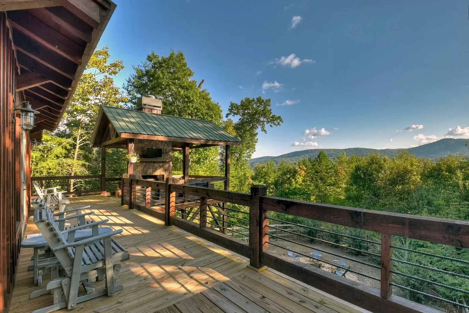 Mountain deck with gazebo, fireplace, and forest views at Blue Ridge chalet