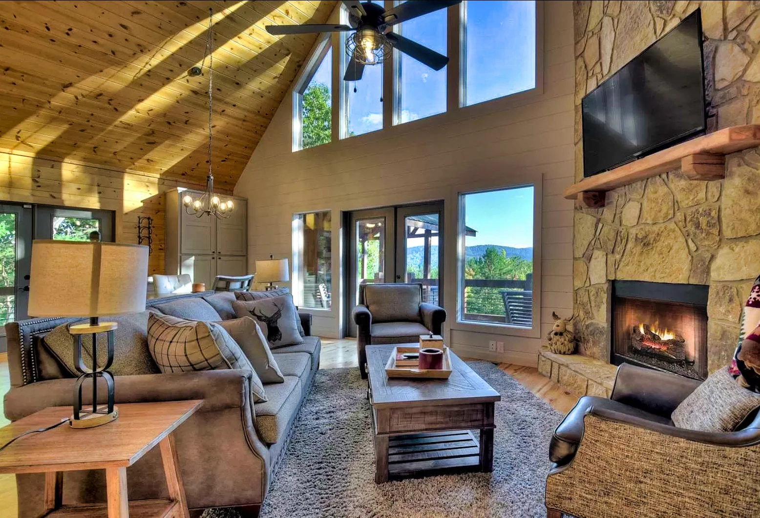 Master bedroom with fireplace and mountain views in a vacation rental vs hotel comparison