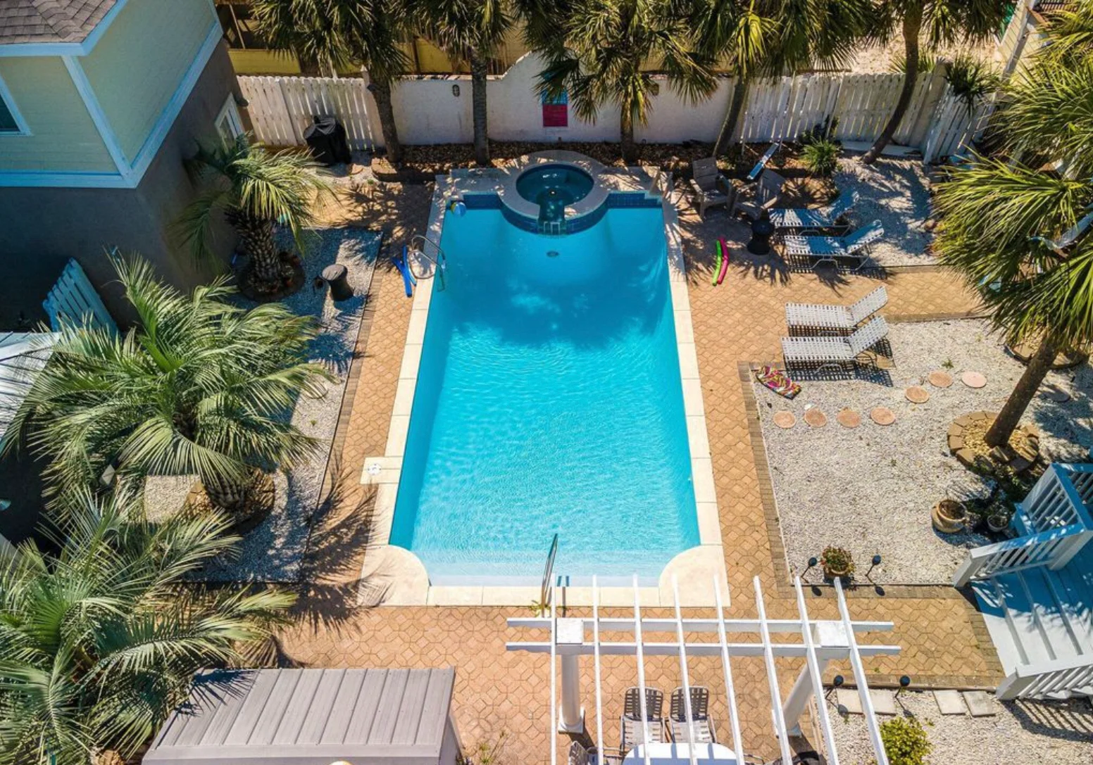 Aerial view of pool and hot tub at a villa, panama city beach where to stay for families