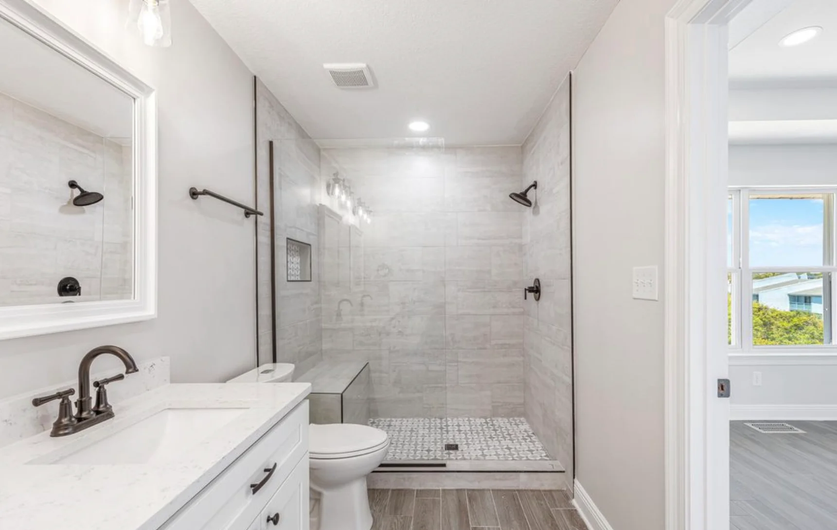 Sea La Vie bathroom with walk-in shower for rinsing off after mini golf near Panama City Beach
