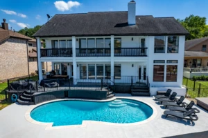 Modern white waterfront home with pool, hot tub and deck in Montgomery vacation rentals